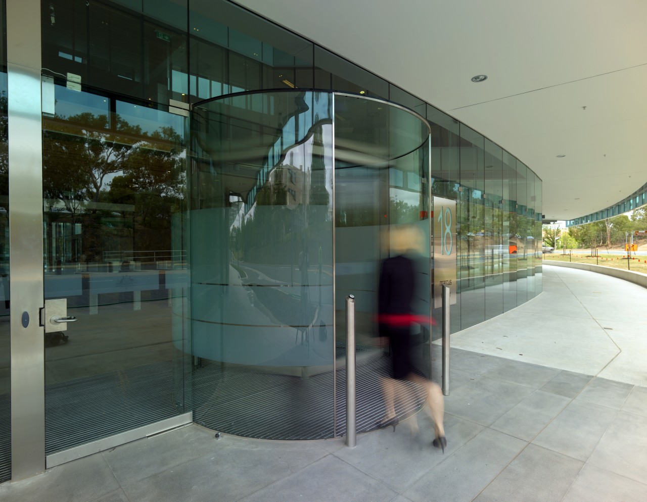 18 Marcus Clarke frameless glass facade and revolving architecture, glass, gray