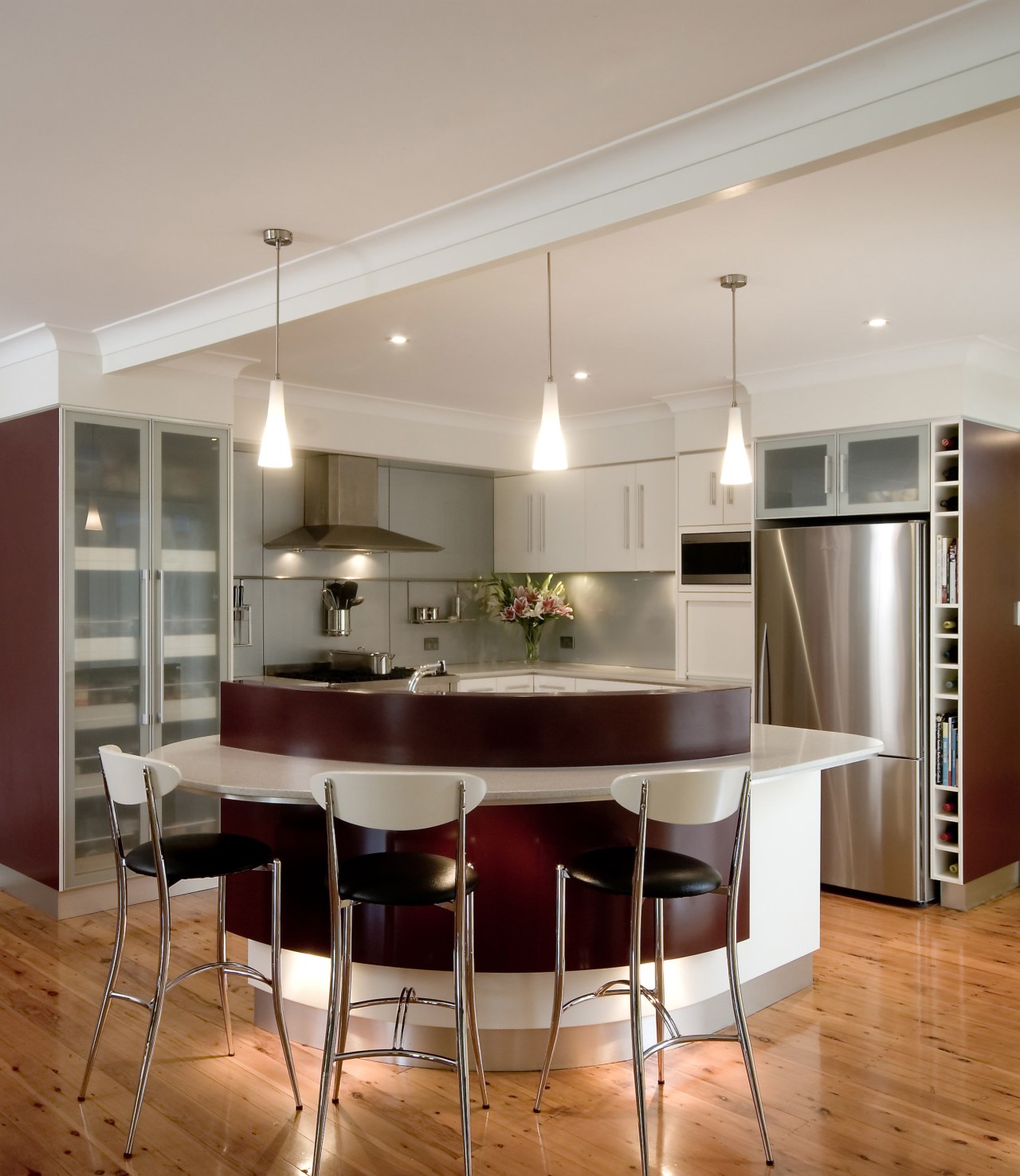 A view of a kitchen deigned by KBDI. ceiling, countertop, dining room, floor, flooring, furniture, interior design, kitchen, real estate, room, table, gray