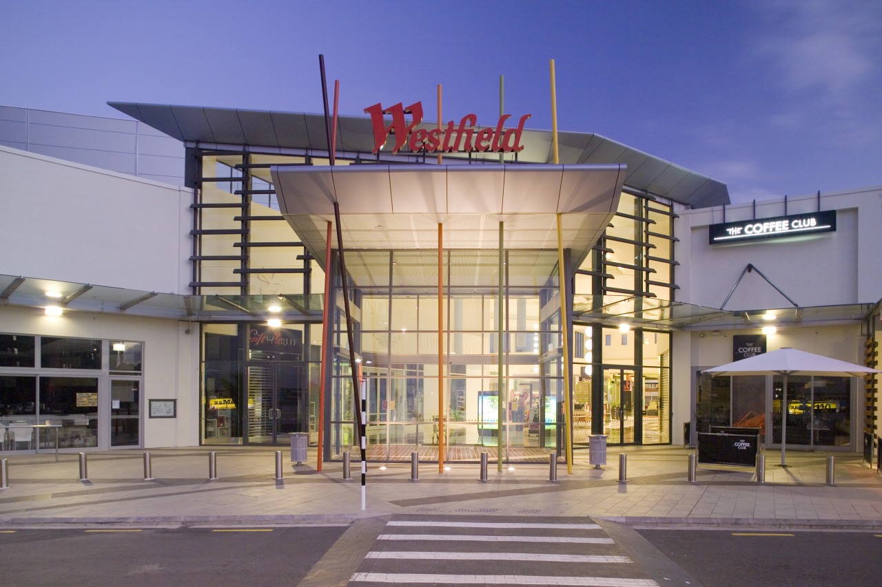 View of Westfield Manukau City Shopping Centre, with architecture, building, commercial building, corporate headquarters, facade, metropolitan area, mixed use, shopping mall, gray, blue