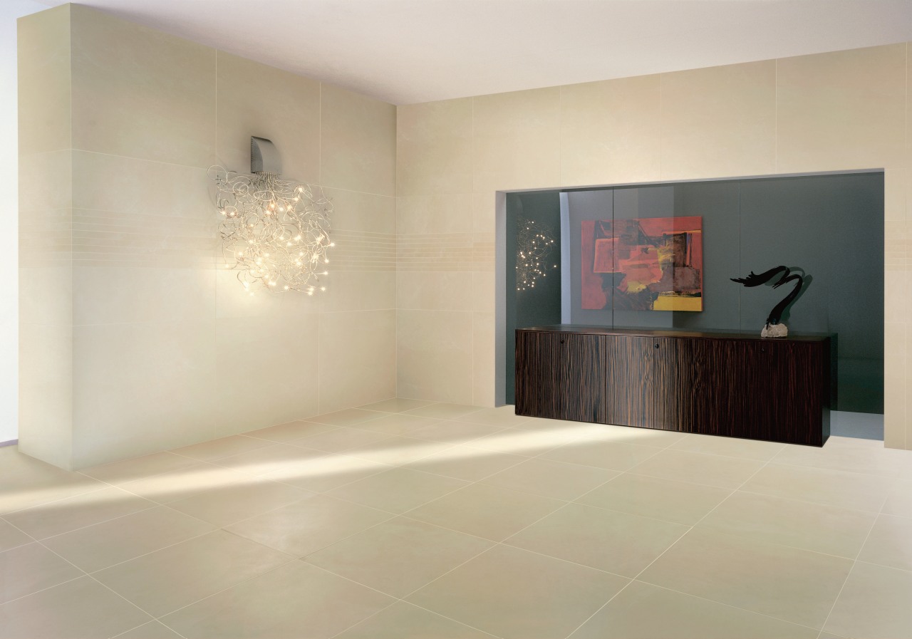 This reception area has been clad in Kerlite floor, flooring, interior design, property, room, tile, wall, orange