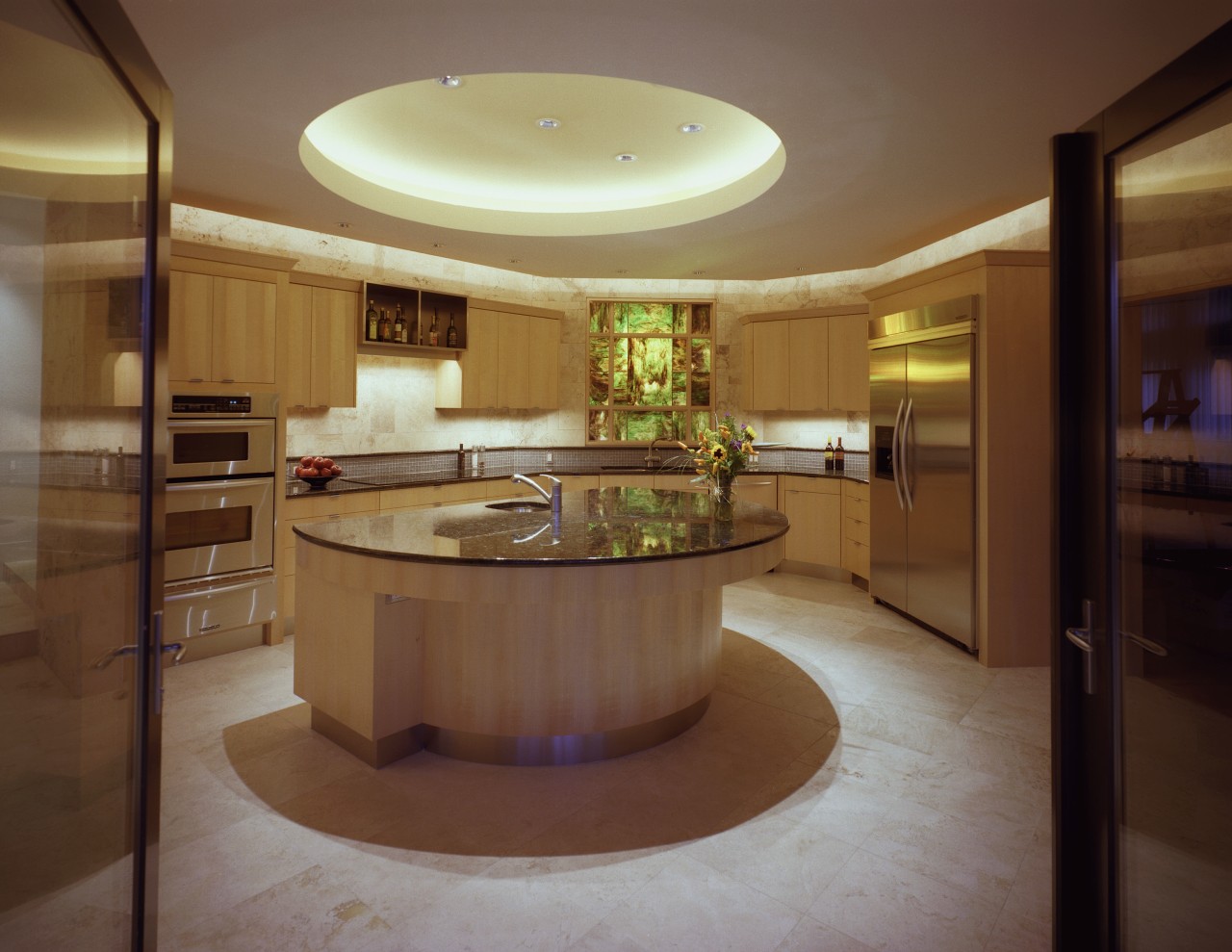 view of kitchen featuring island, tiled floor, wall ceiling, countertop, estate, interior design, kitchen, lobby, real estate, room, brown