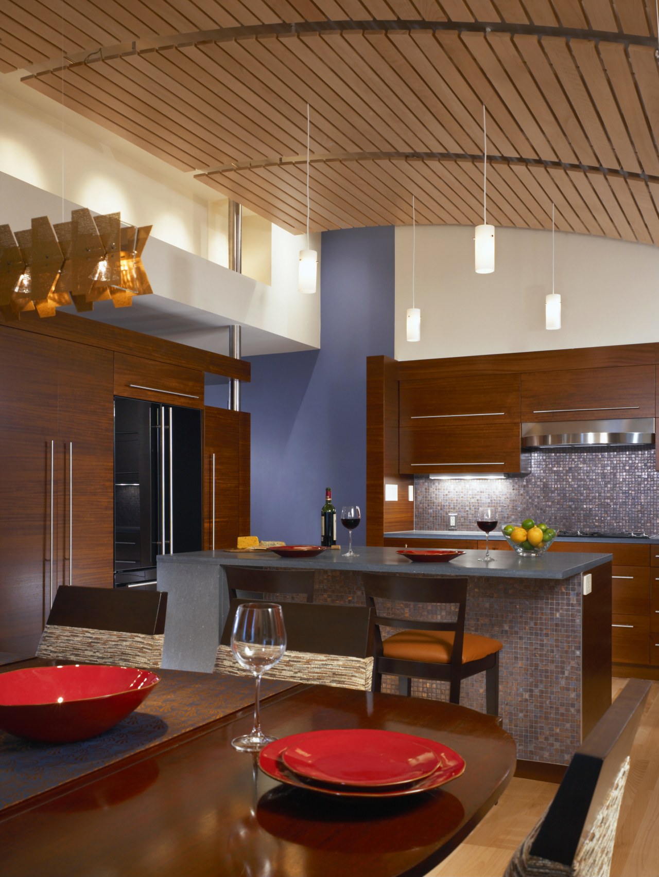 view of kitchen including tiled splashback, wall tiles, architecture, ceiling, countertop, interior design, kitchen, lighting, living room, room, table, wood, brown