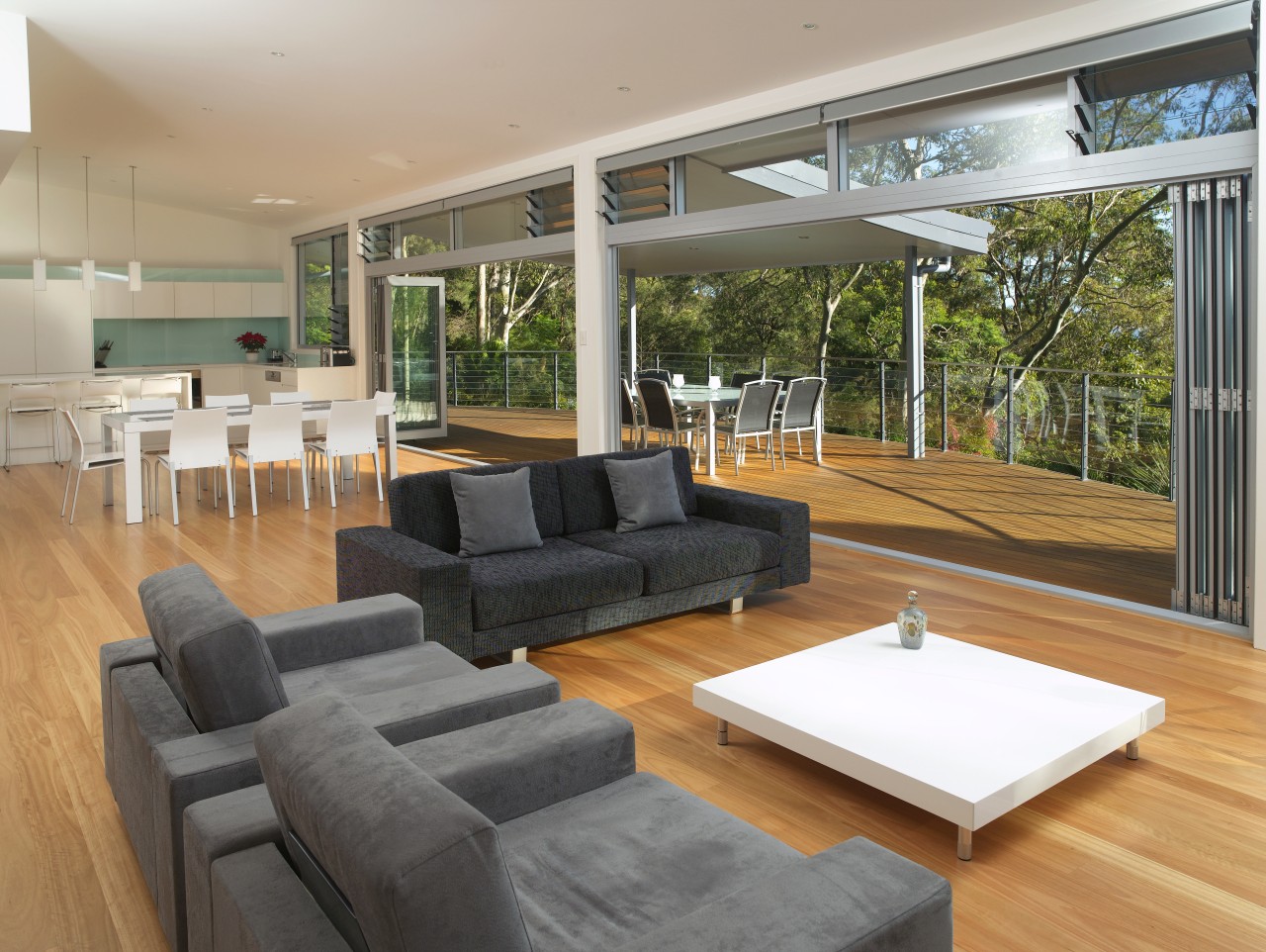 Seamlessly merging interior and exterior living spaces in architecture, daylighting, estate, floor, house, interior design, living room, property, real estate, window, gray