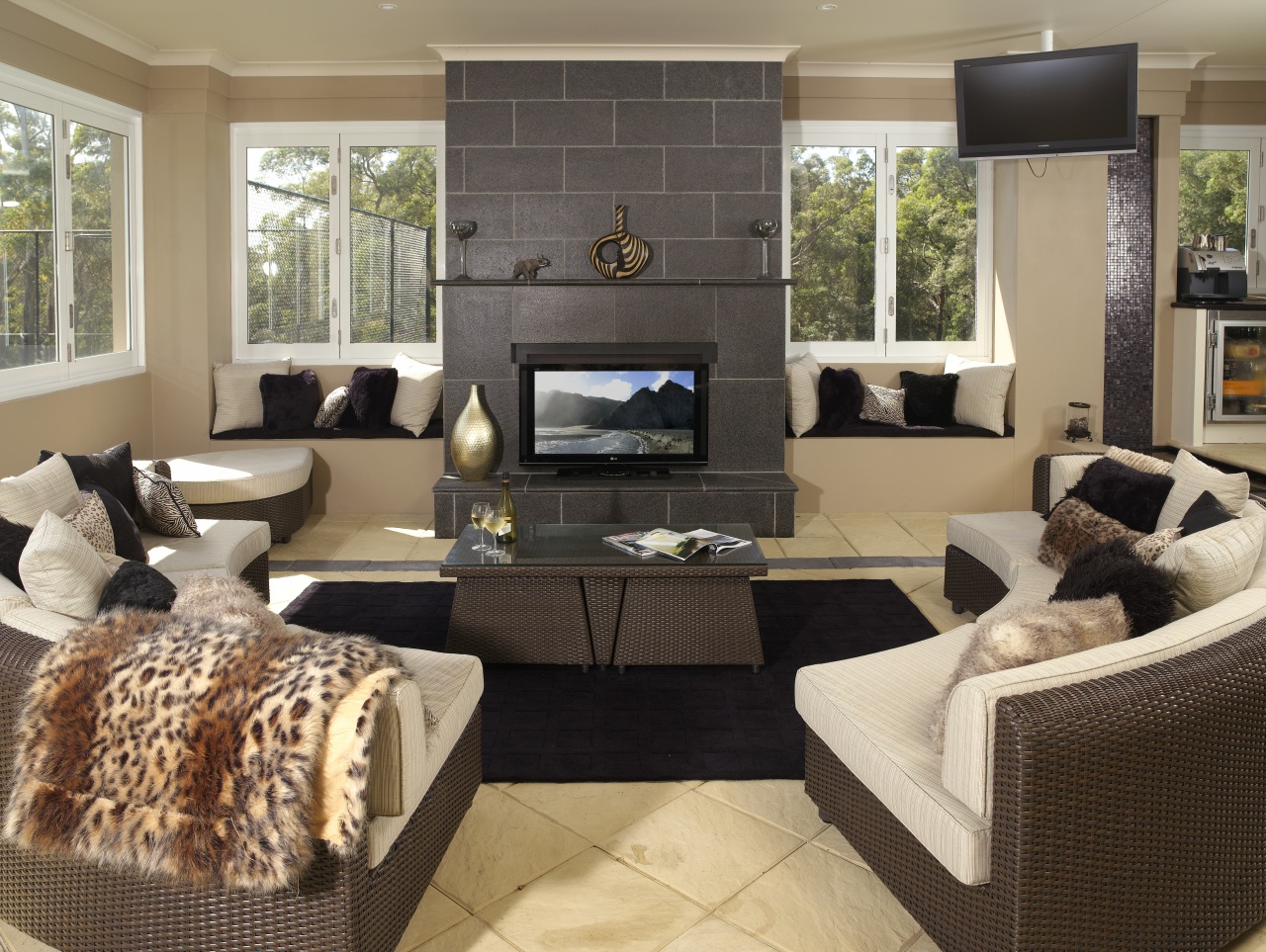 With the LCD television, the image colour and floor, furniture, hearth, home, interior design, living room, room, black