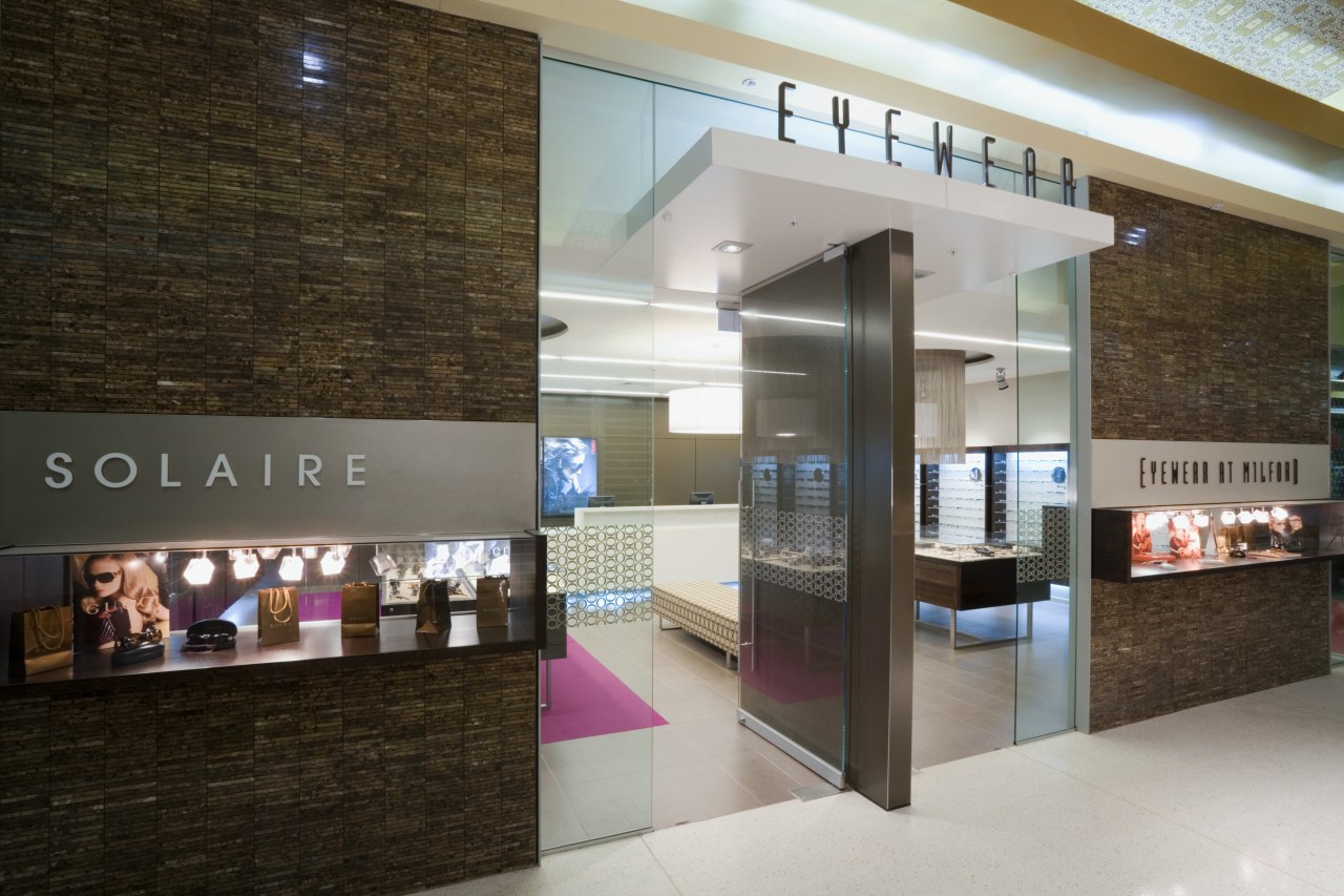 Image of Eyewear shop featuring cladding, cabinetry, tiled interior design, lobby, gray, brown