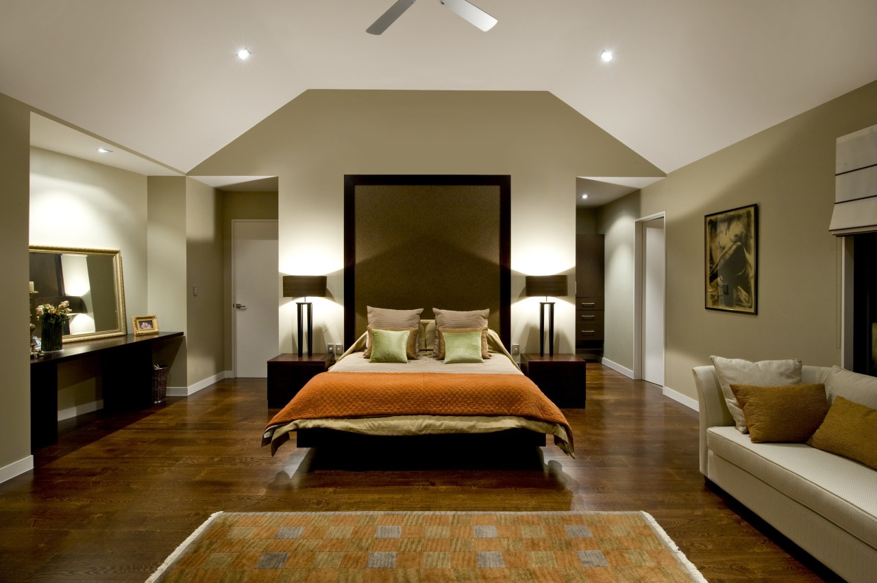 Master bedroom inside resort-style home with walls painted bedroom, ceiling, estate, floor, flooring, interior design, living room, real estate, room, suite, wall, wood flooring, brown