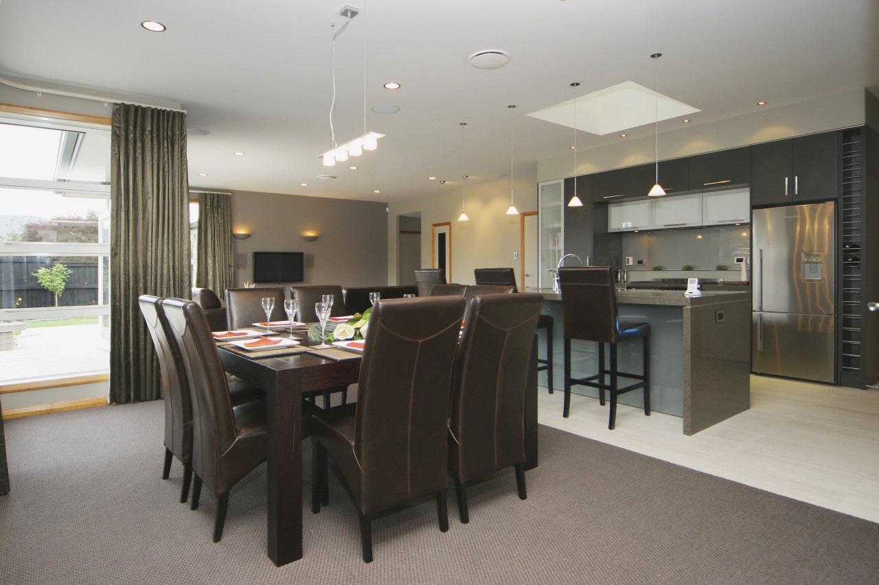 Dining area inside home designed and built by dining room, flooring, interior design, kitchen, real estate, room, table, gray, black