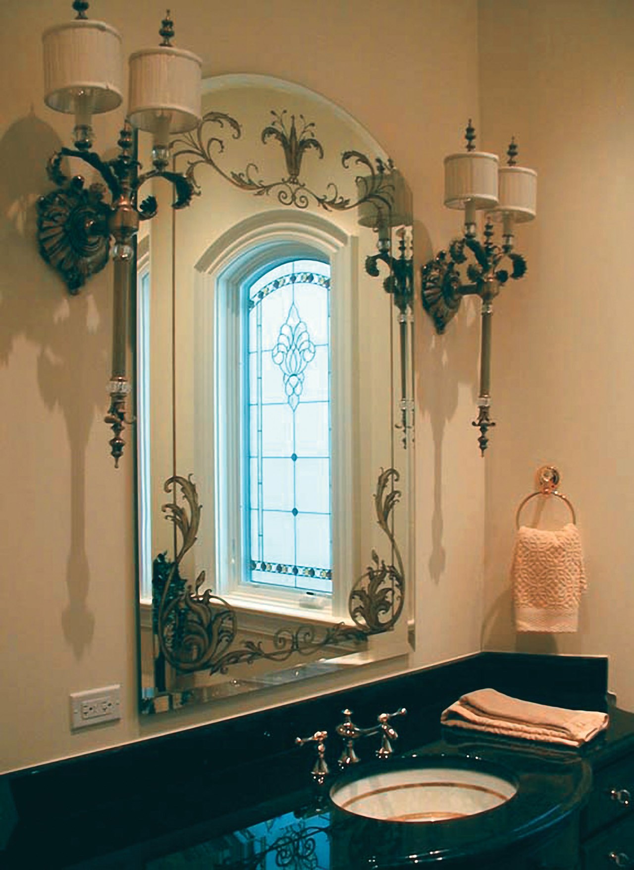 The beveled mirror in this bathroom has been bathroom, home, interior design, room, wall, window, brown, orange