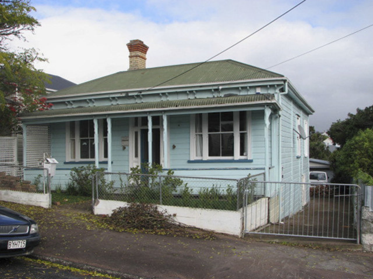 The original sash windows at the front of building, cottage, estate, facade, historic house, home, house, neighbourhood, property, real estate, residential area, roof, siding, suburb, window, gray