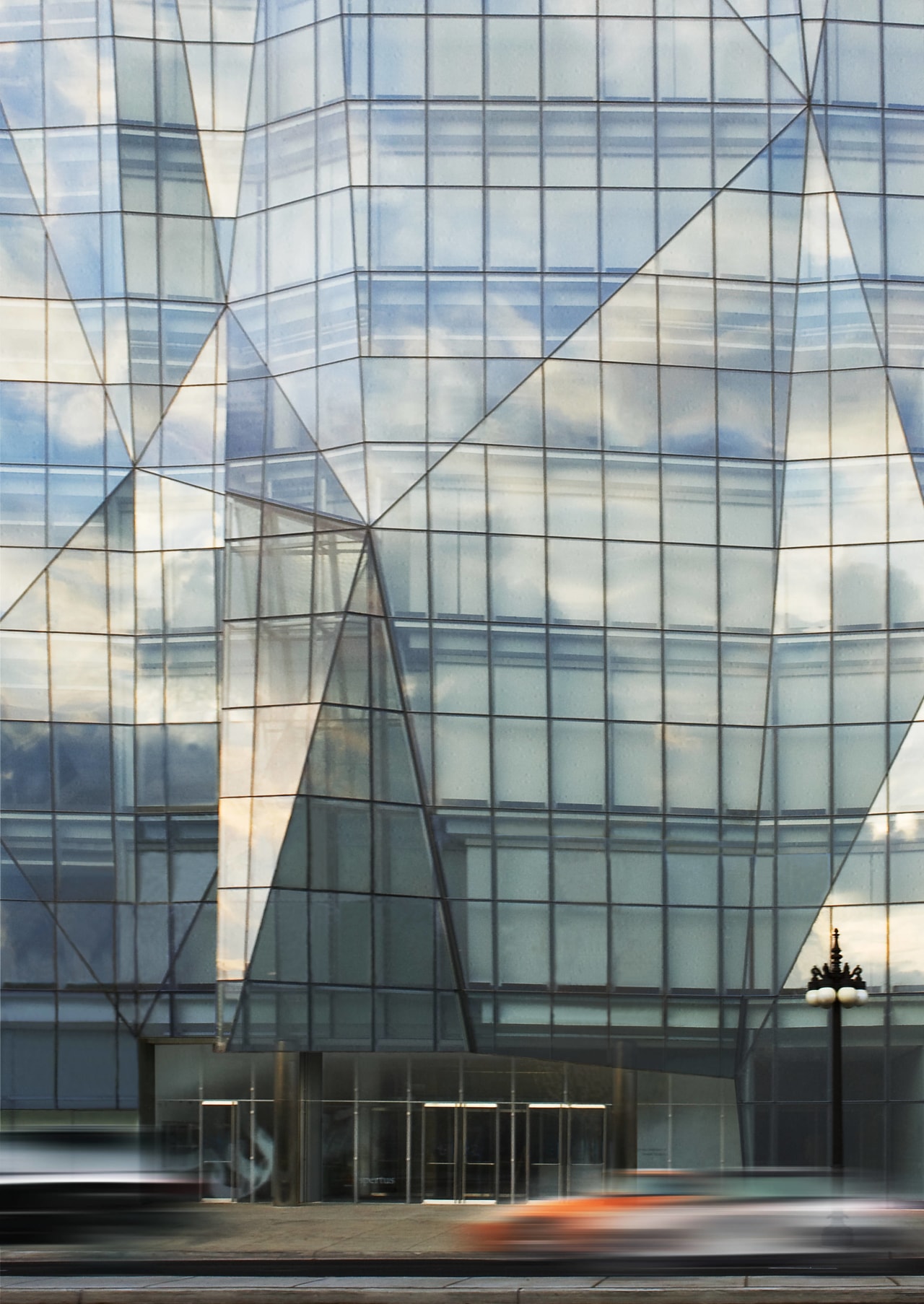 Enviromental sustainability, a key tenet of the Jewish architecture, building, corporate headquarters, daylighting, daytime, facade, glass, headquarters, line, reflection, sky, skyscraper, structure, tower block, window, gray