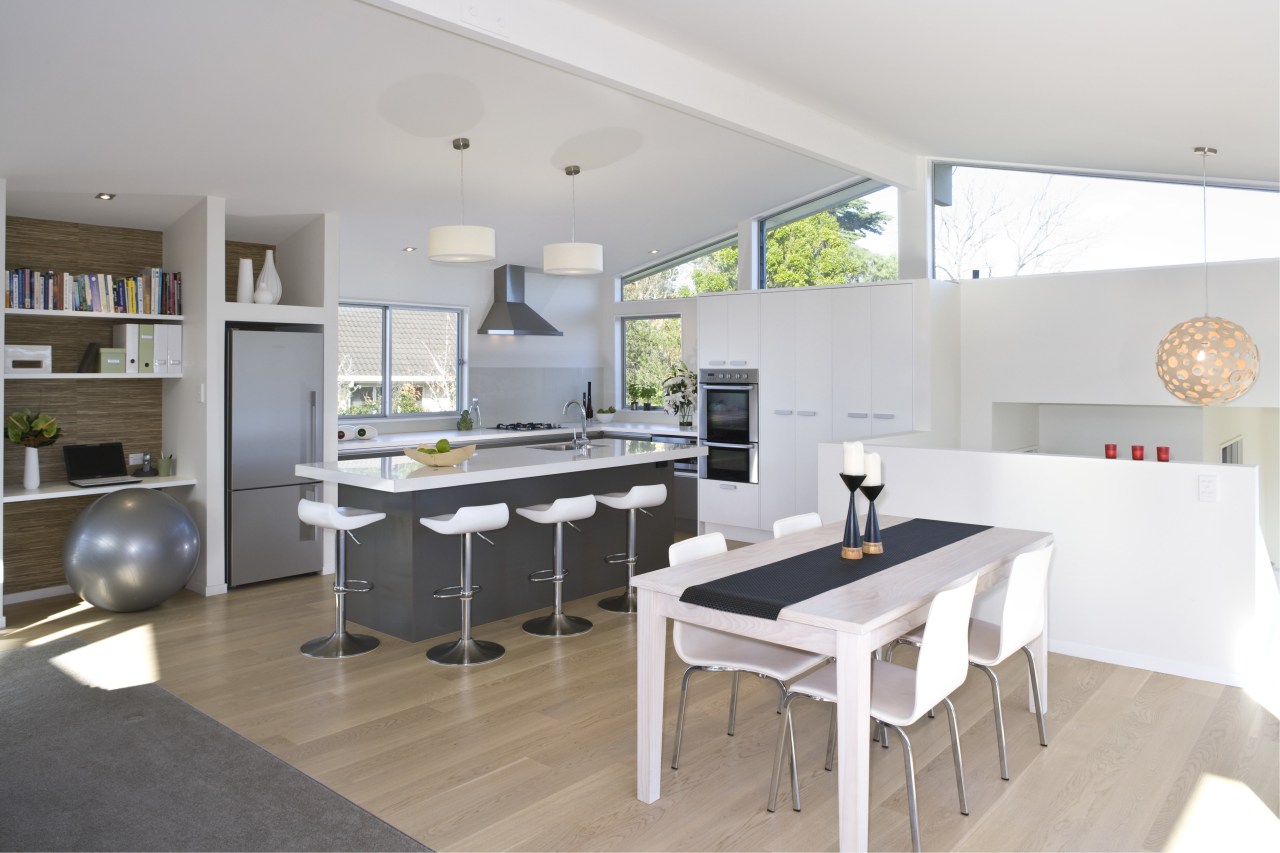 The living room and kitchen in this house architecture, interior design, kitchen, real estate, table, white, gray