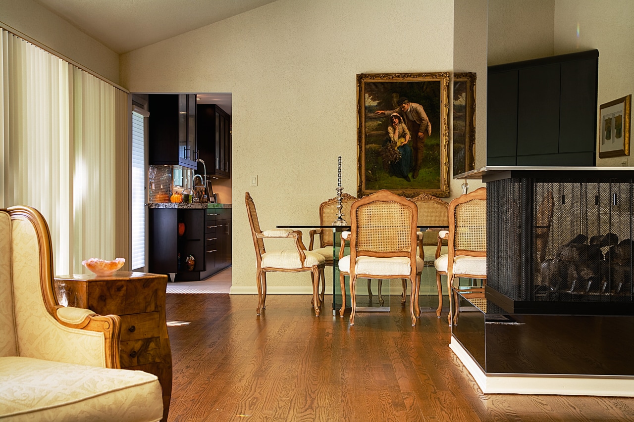 A glimpse of what's to come. This kitchen chair, floor, flooring, furniture, hardwood, home, interior design, living room, real estate, room, wood, wood flooring, brown, orange