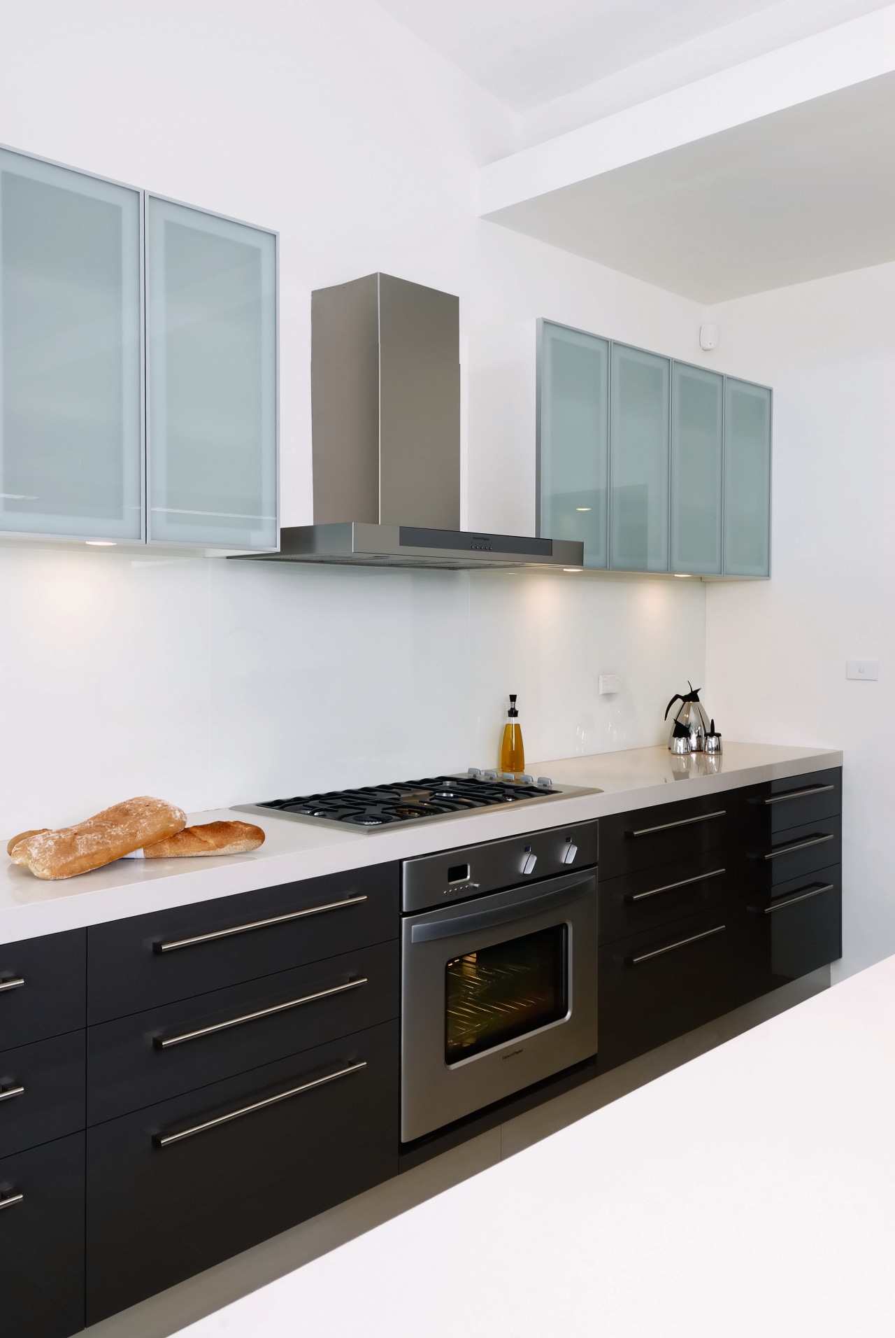 The 76cm wide Titan OS302M multi function oven cabinetry, countertop, home appliance, interior design, kitchen, kitchen stove, product design, room, sink, white