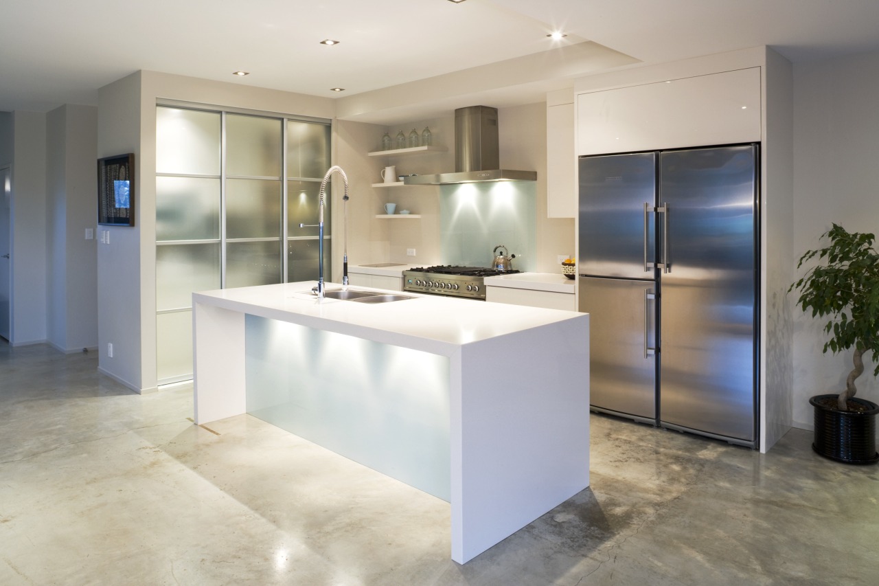 View of a kitchen which features underfloor heating countertop, floor, flooring, interior design, kitchen, real estate, gray