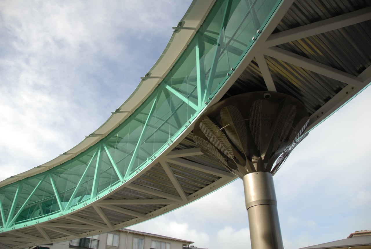 The Vision Waitakere Gardens skybridge snakes across a architecture, bridge, fixed link, girder bridge, infrastructure, overpass, sky, structure, white