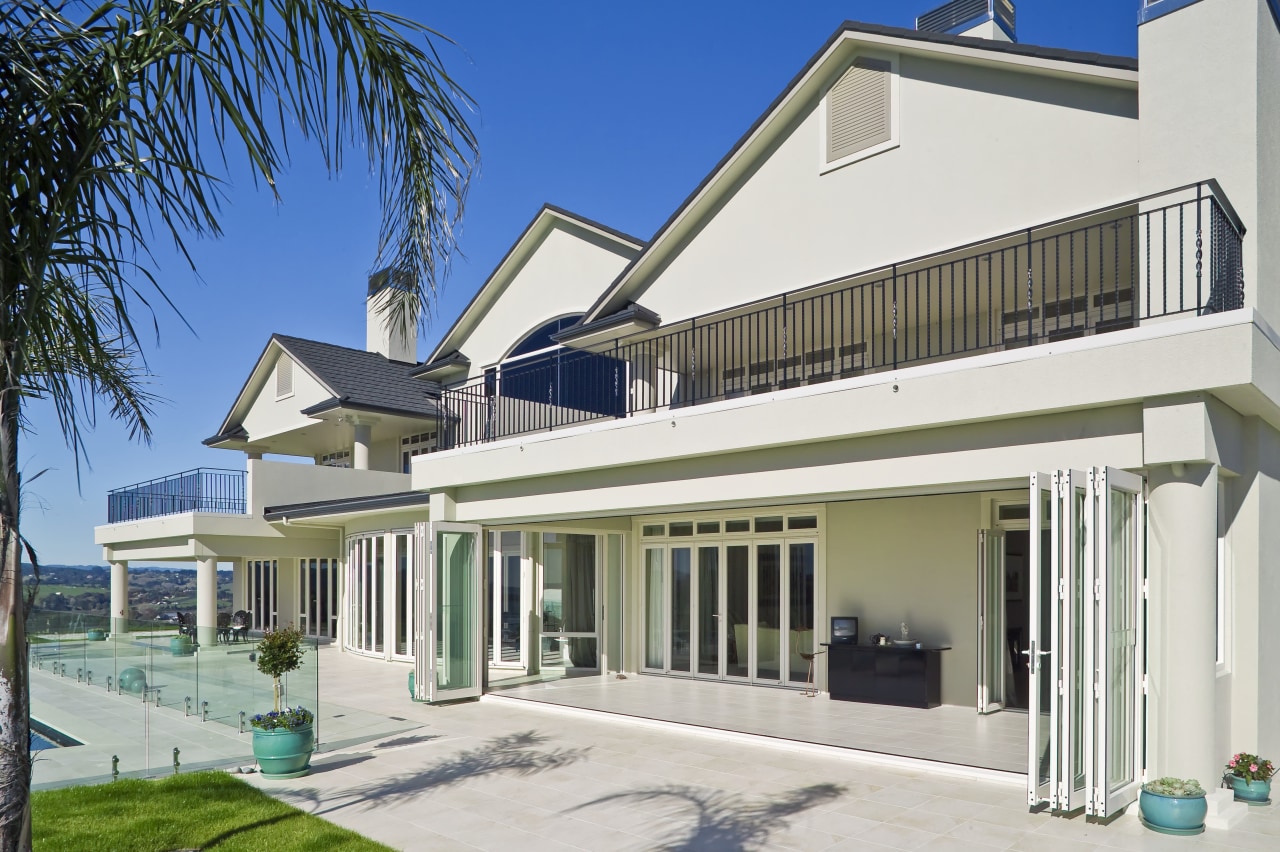 Large internal and external bifold doors open up architecture, building, elevation, estate, facade, home, house, mansion, property, real estate, residential area, roof, villa, window, white