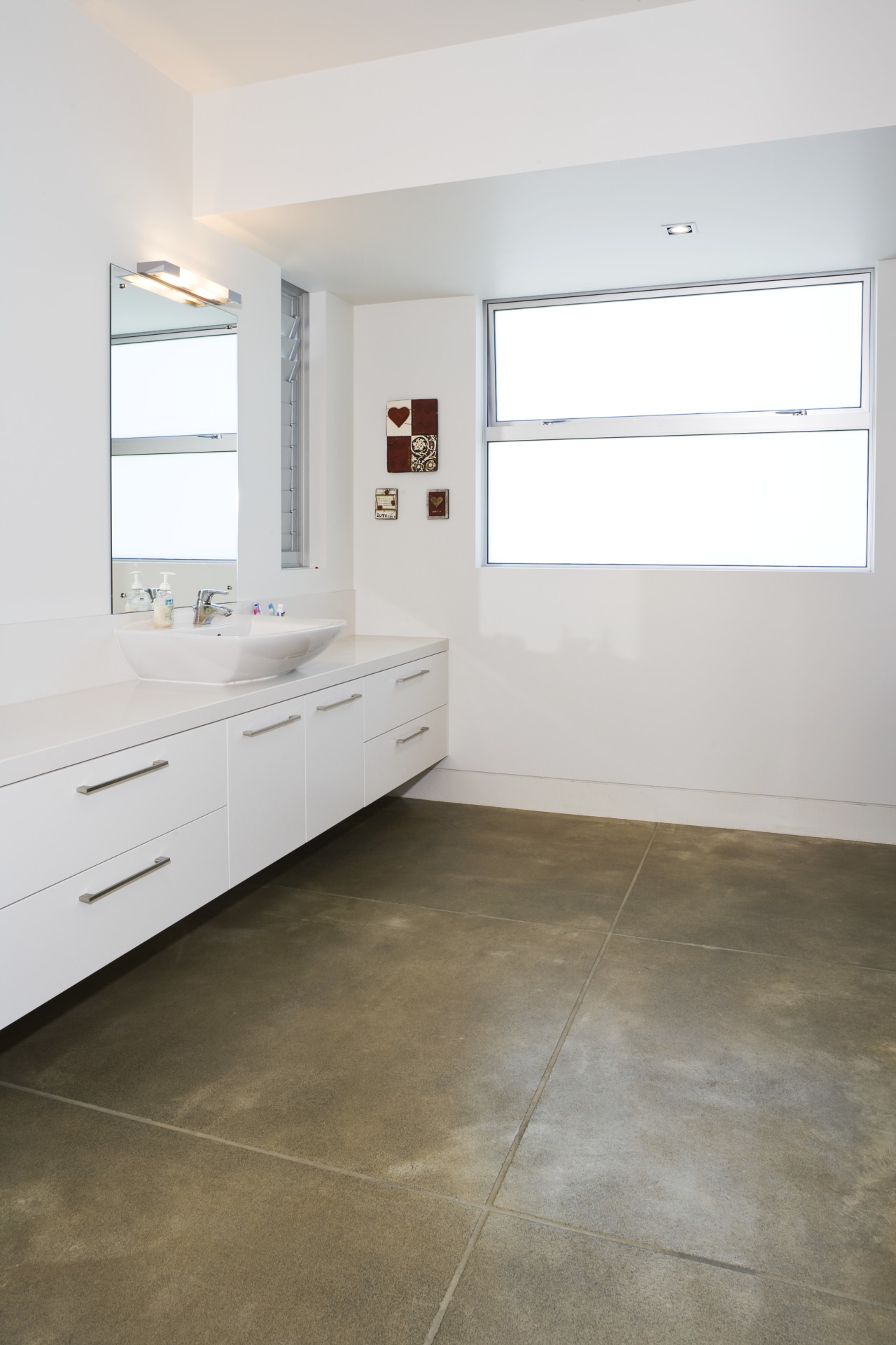 The flooring was used for the entire downstairs floor, flooring, hardwood, home, interior design, laminate flooring, property, real estate, room, tile, wall, wood, wood flooring, white