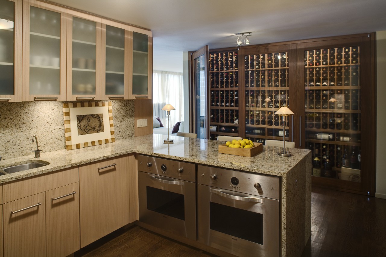 This apartment had a wine storage area fitted cabinetry, countertop, cuisine classique, interior design, kitchen, room, brown