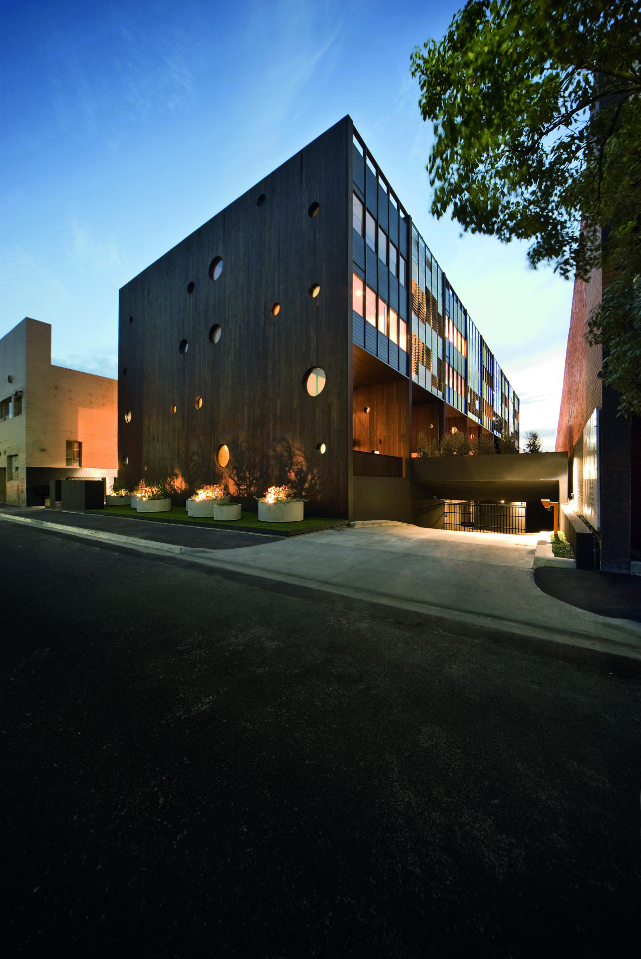 Exterior view of the Hue apartment building which apartment, architecture, building, commercial building, condominium, corporate headquarters, estate, facade, headquarters, home, house, mixed use, property, real estate, residential area, sky, black