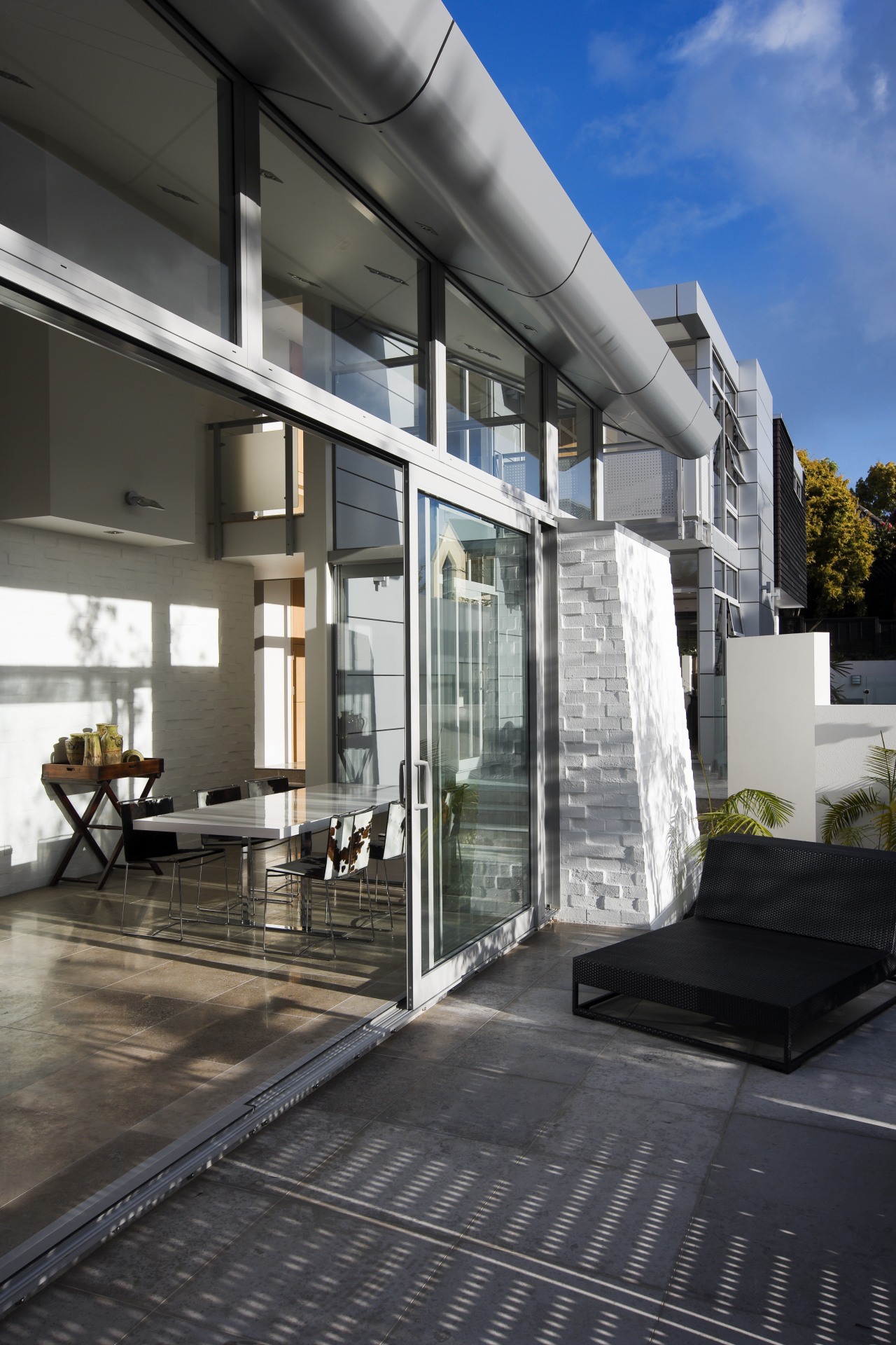 View of sliding doors from Able Aluminium. architecture, building, condominium, daylighting, facade, home, house, interior design, real estate, window, black, gray