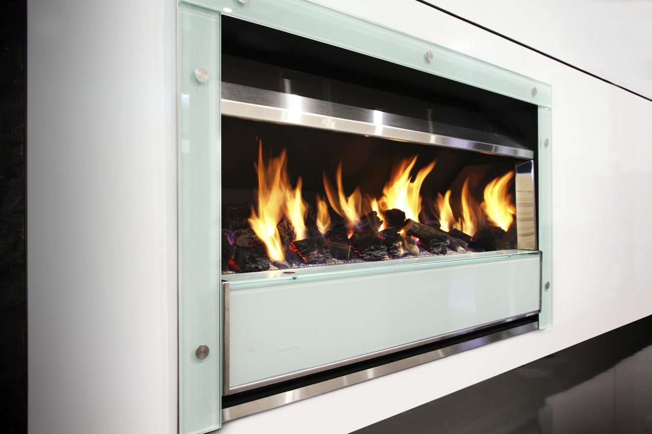 Flameboyant designs and makes a range of fires fireplace, hearth, heat, wood burning stove, white