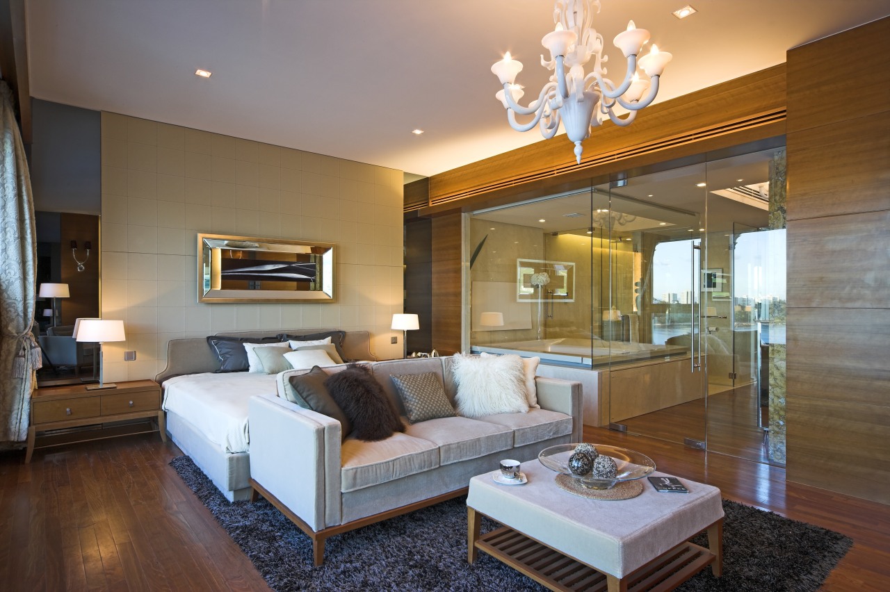 Master suite in a Hong Kong waterside apartment.Featuring ceiling, estate, floor, hardwood, home, interior design, living room, real estate, room, suite, wall, wood flooring, brown, gray