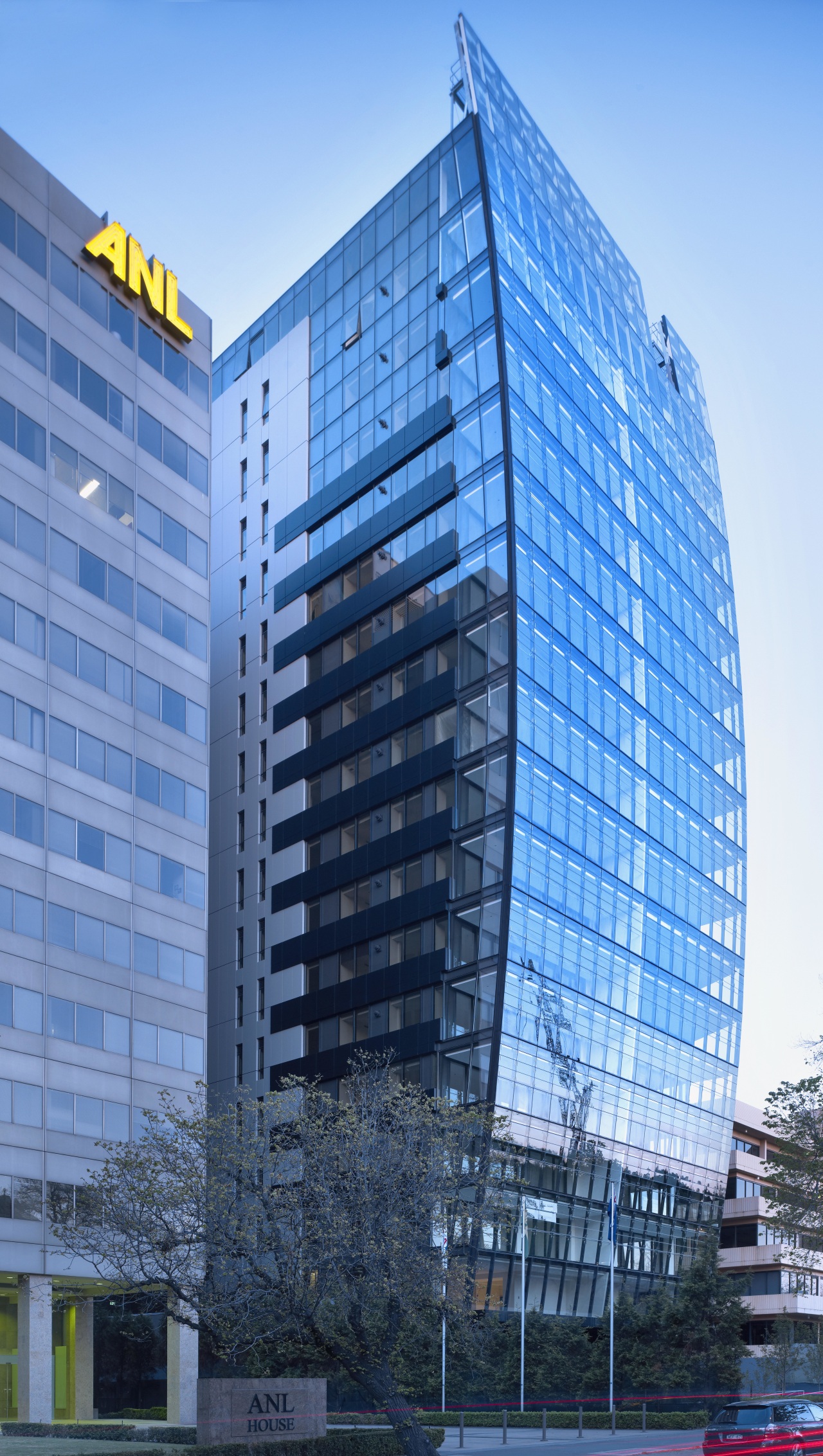 Exterior view of the Lucient apartments in Melbourne apartment, architecture, building, city, commercial building, condominium, corporate headquarters, daytime, downtown, facade, headquarters, hotel, landmark, metropolis, metropolitan area, mixed use, neighbourhood, real estate, reflection, residential area, sky, skyscraper, tower block, urban area, teal, blue