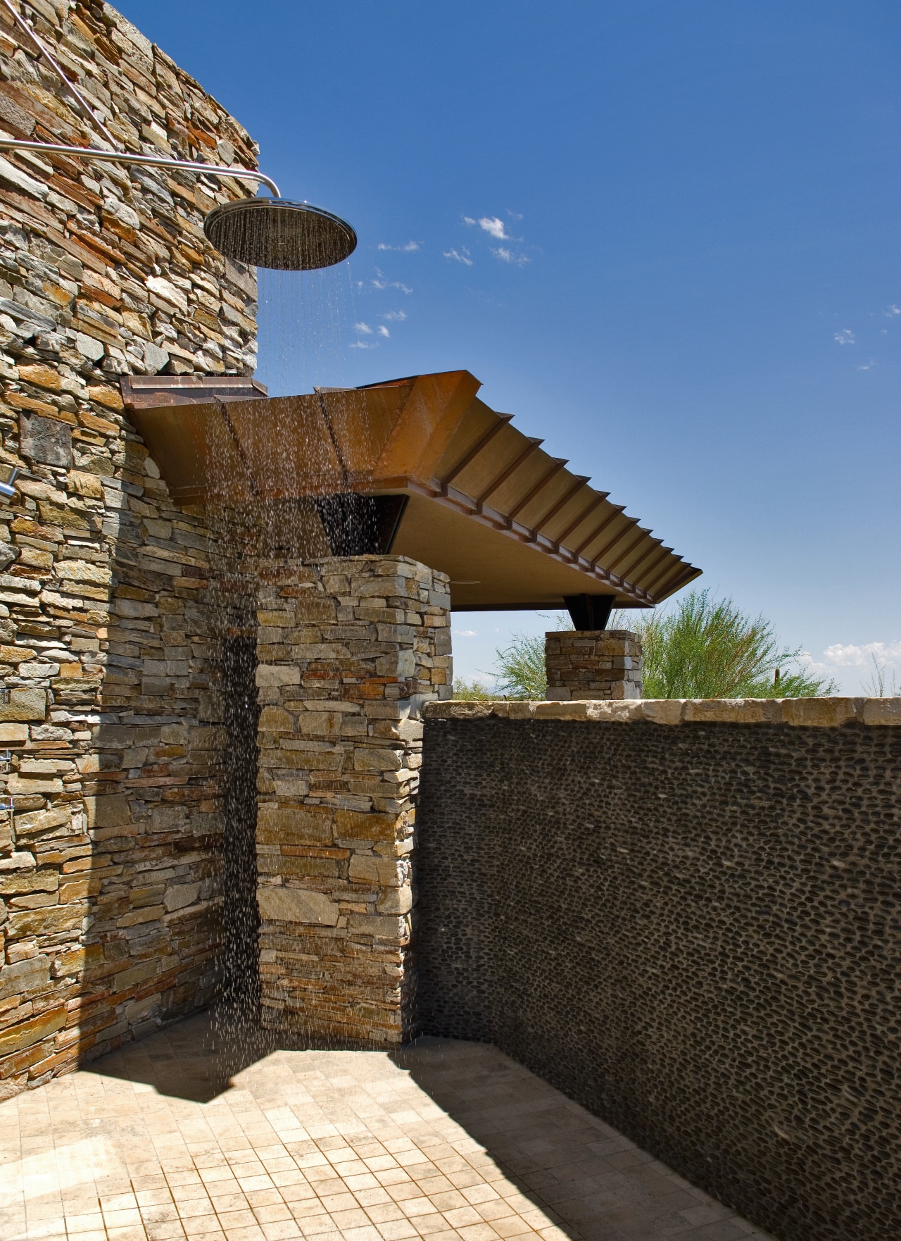 View of outdoor shower which is reached from architecture, sky, wall, black, blue