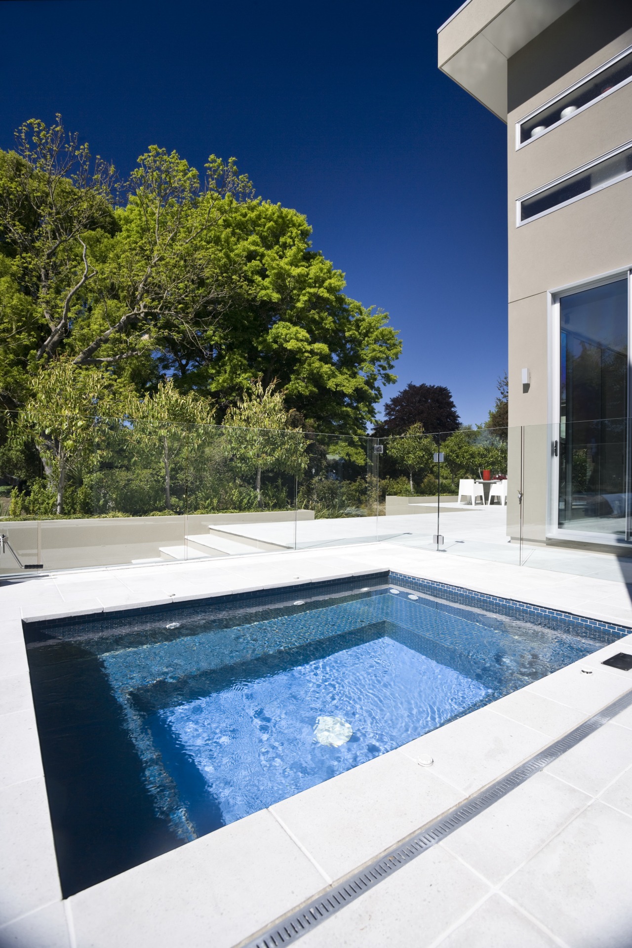 Exterior view of house and spa pool area architecture, estate, home, house, leisure, property, real estate, reflection, sky, swimming pool, vacation, villa, water, white, blue