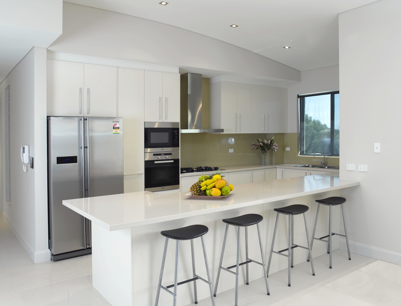 View of kitchen which features a Miele oven, cabinetry, countertop, cuisine classique, interior design, kitchen, real estate, room, gray