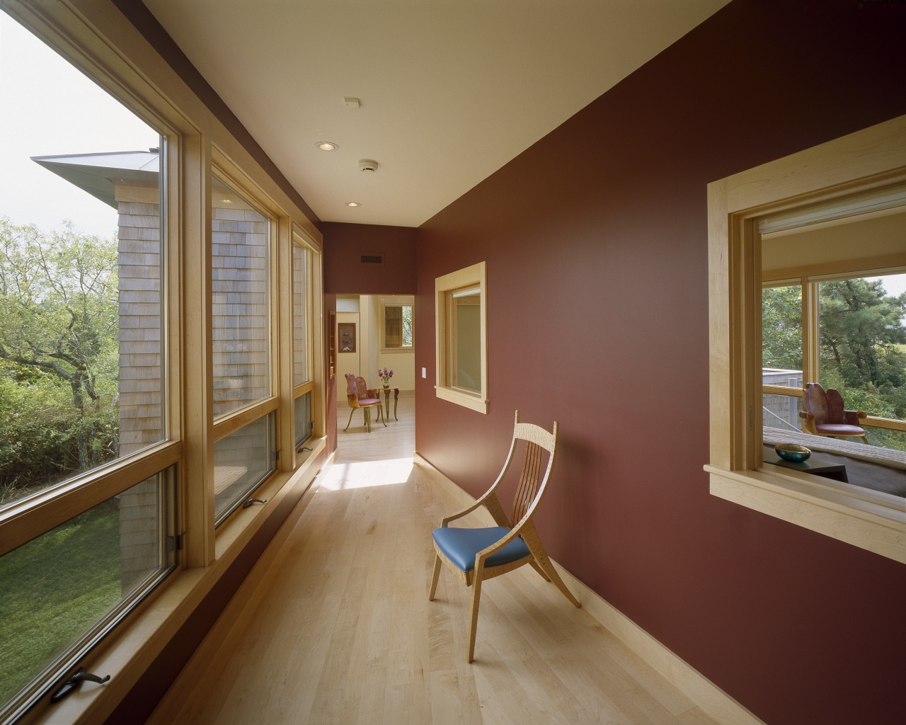 View of hallway with maple wood flooring, windows, architecture, ceiling, daylighting, estate, floor, hardwood, home, house, interior design, laminate flooring, living room, property, real estate, room, wall, window, wood, wood flooring, brown