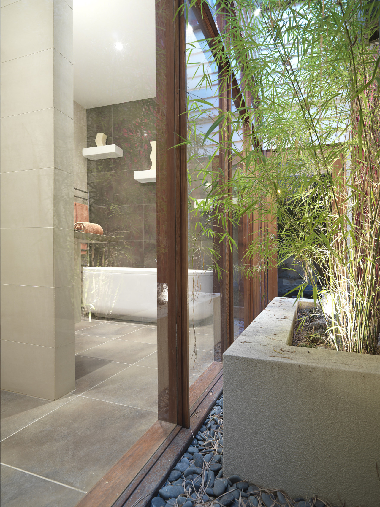 View of renovated bathroom, featuring bathtub, ceramic tiled architecture, door, glass, home, house, interior design, property, real estate, window, gray, brown