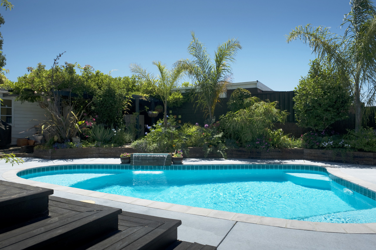 view a pool built and designed by Pool backyard, estate, home, house, landscape, landscaping, leisure, plant, property, real estate, resort, swimming pool, tree, villa, water, water feature, yard, teal