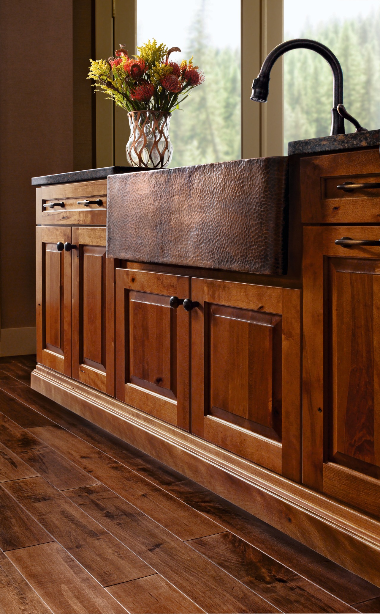 View of a kitchen which features cabinetry available cabinetry, chest of drawers, drawer, floor, flooring, furniture, hardwood, home, interior design, laminate flooring, sideboard, table, wood, wood flooring, wood stain, brown