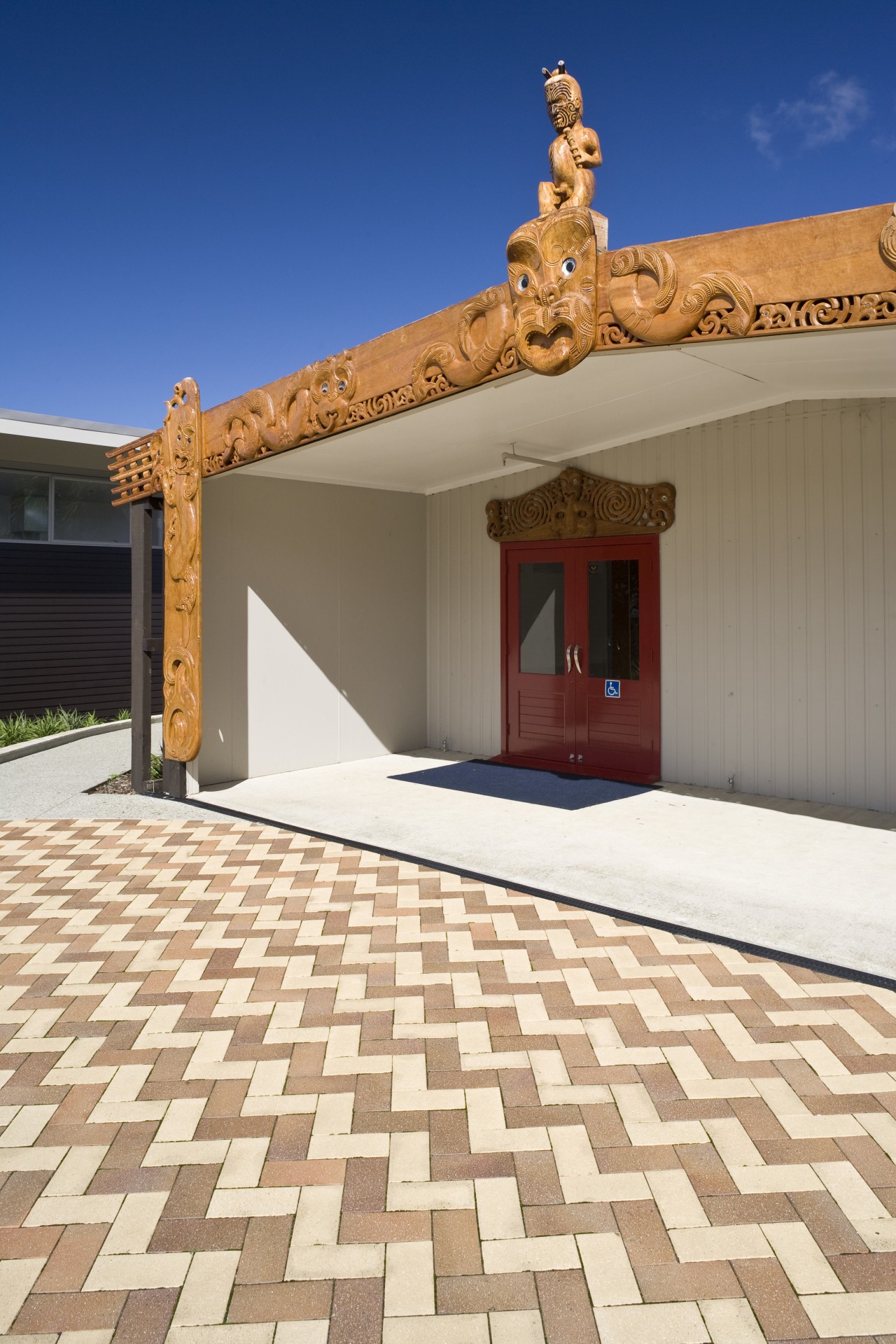 Image of paving completed by P and M estate, facade, floor, home, outdoor structure, property, real estate, roof, sky, orange