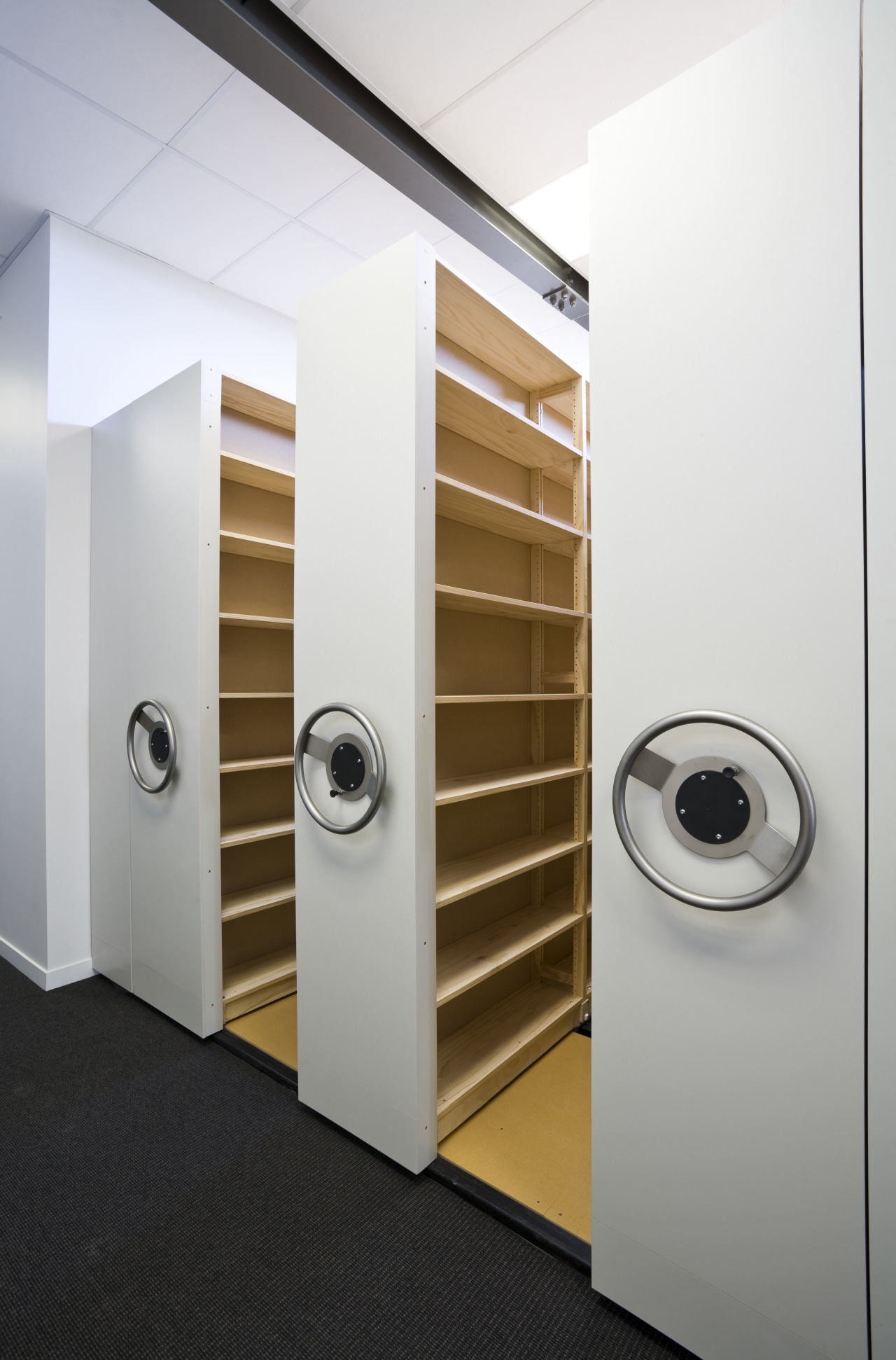 Image of the space saving Lundia Mobile Shelving product, product design, white