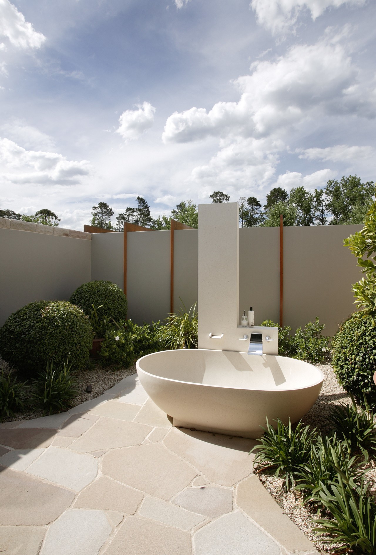 View of an outdoor freestanding bathtub and shower architecture, backyard, estate, home, house, outdoor structure, property, real estate, white