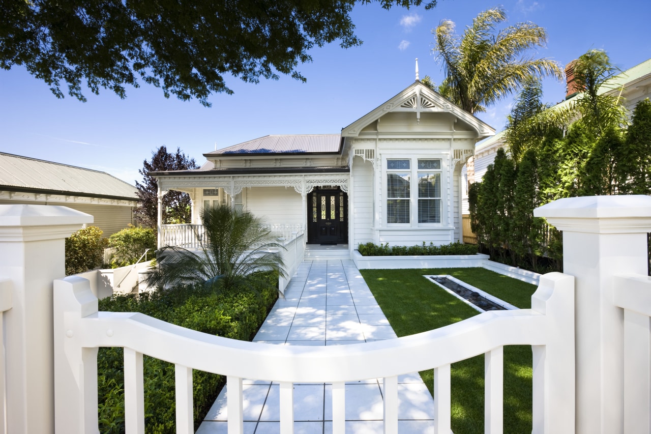 View of white house with light-toned interior with backyard, cottage, estate, facade, home, house, mansion, property, real estate, residential area, villa, white