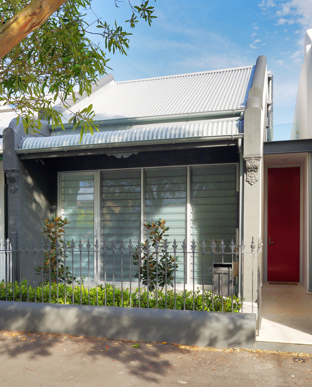 Exterior view of the front facade of the facade, house, property, real estate, structure, window