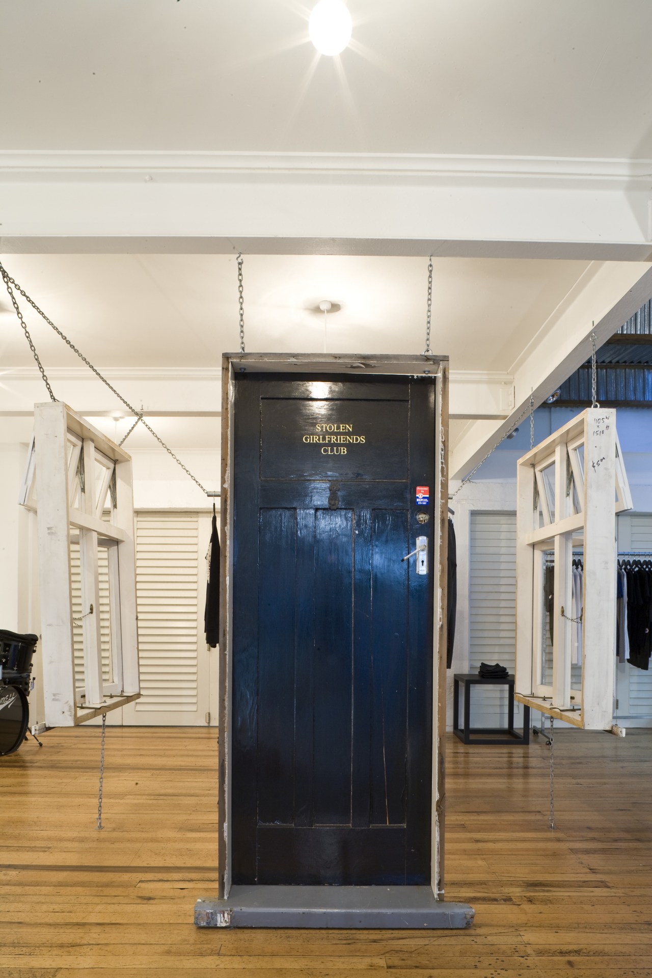 View of the old construction door which is glass, white