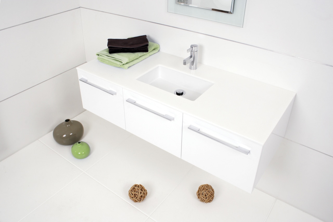 View of a bathroom which features a wall-hung bathroom, bathroom accessory, bathroom cabinet, bathroom sink, drawer, furniture, plumbing fixture, product design, sink, tap, white