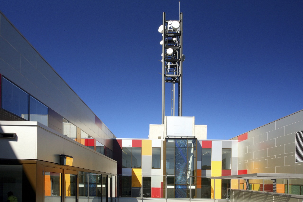 Exterior view of the Auburn Hospital built by architecture, building, corporate headquarters, metropolitan area, mixed use, sky, structure, tower, blue