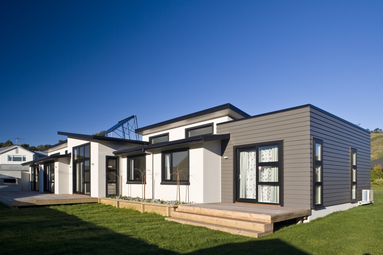 Exterior view of a David Reid Homes show architecture, building, cottage, elevation, estate, facade, home, house, property, real estate, residential area, siding, blue