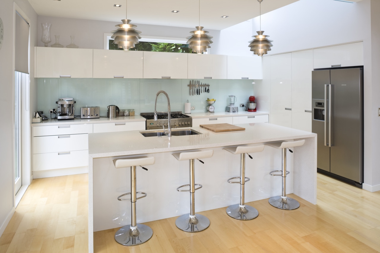 View of a kitchen in a house designed countertop, cuisine classique, interior design, kitchen, real estate, room, gray