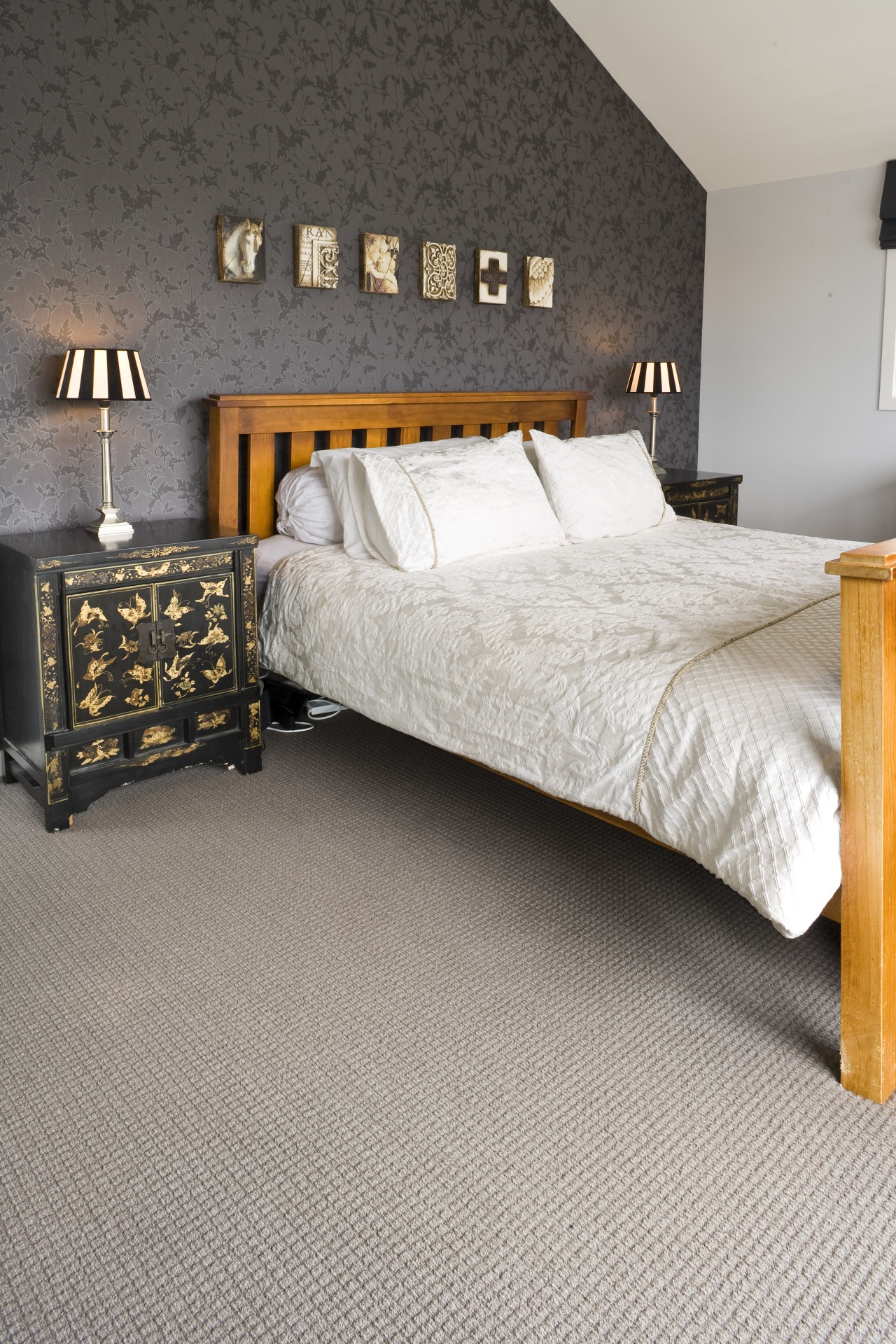 View of a bedroom area which features pure bed, bed frame, bed sheet, bedroom, duvet cover, floor, flooring, furniture, hardwood, home, interior design, laminate flooring, mattress, room, wall, wood, wood flooring, gray