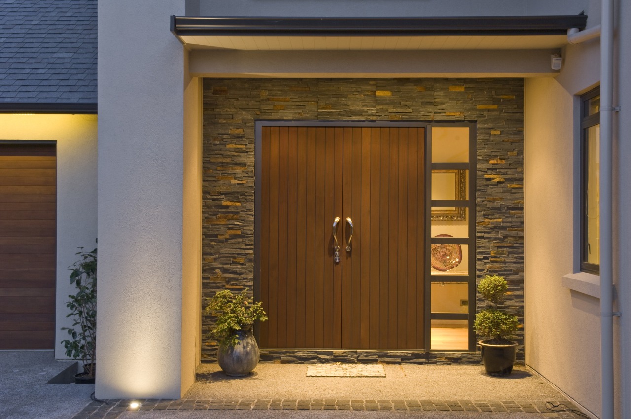 Exterior view of a home constructed by Walmsley door, facade, home, house, brown