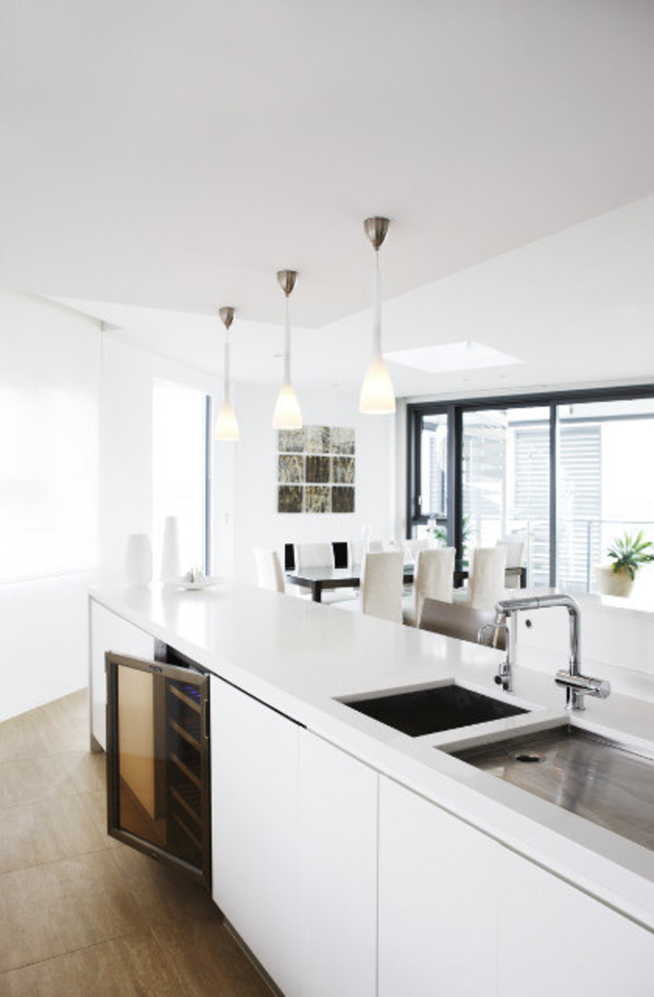 View of a modern kitchen which features a ceiling, countertop, cuisine classique, home, interior design, kitchen, room, white