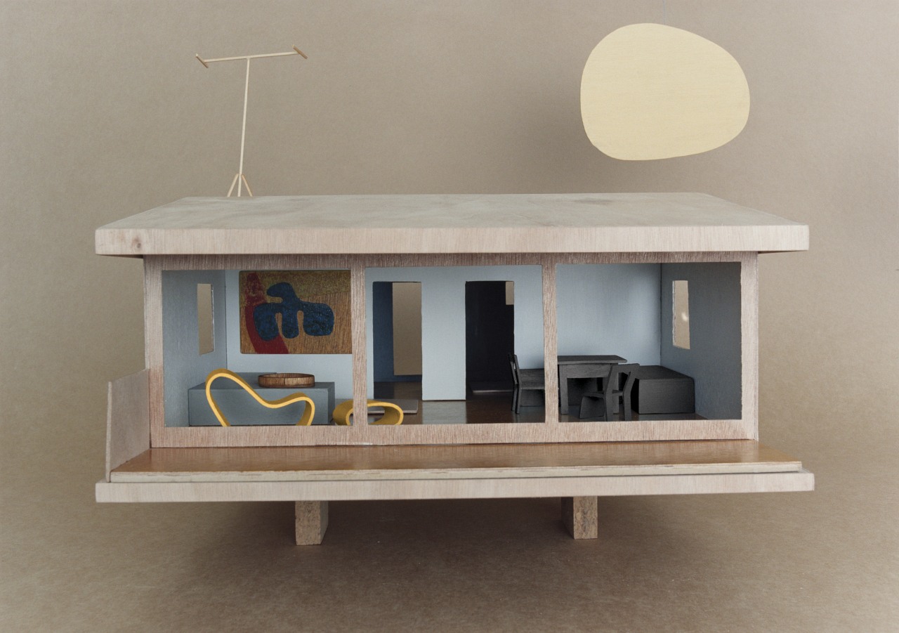 View of an architectural model which features paints furniture, product design, shelf, shelving, table, gray