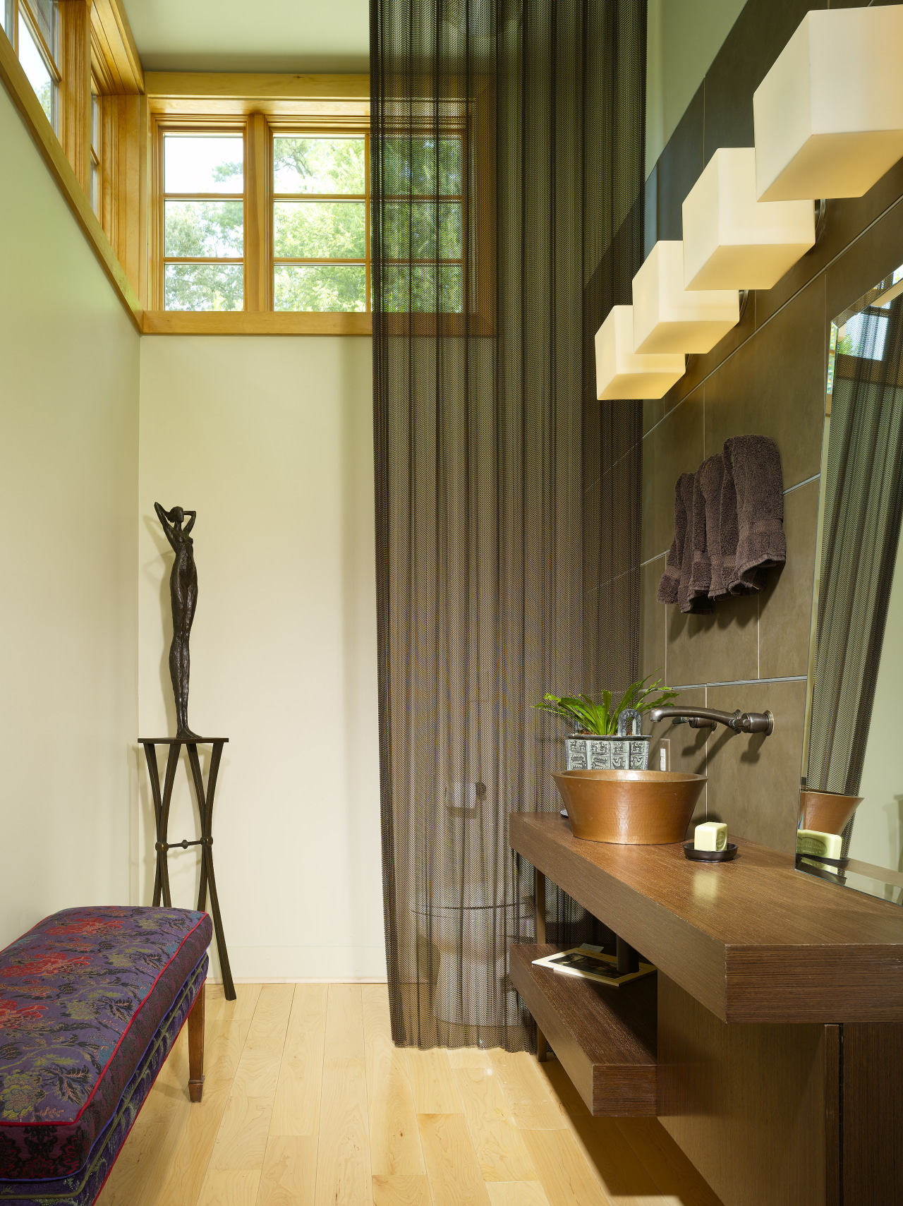 View of a small powder room which features architecture, ceiling, curtain, floor, flooring, furniture, hardwood, home, house, interior design, living room, real estate, room, table, wall, window, window covering, window treatment, wood, brown, yellow