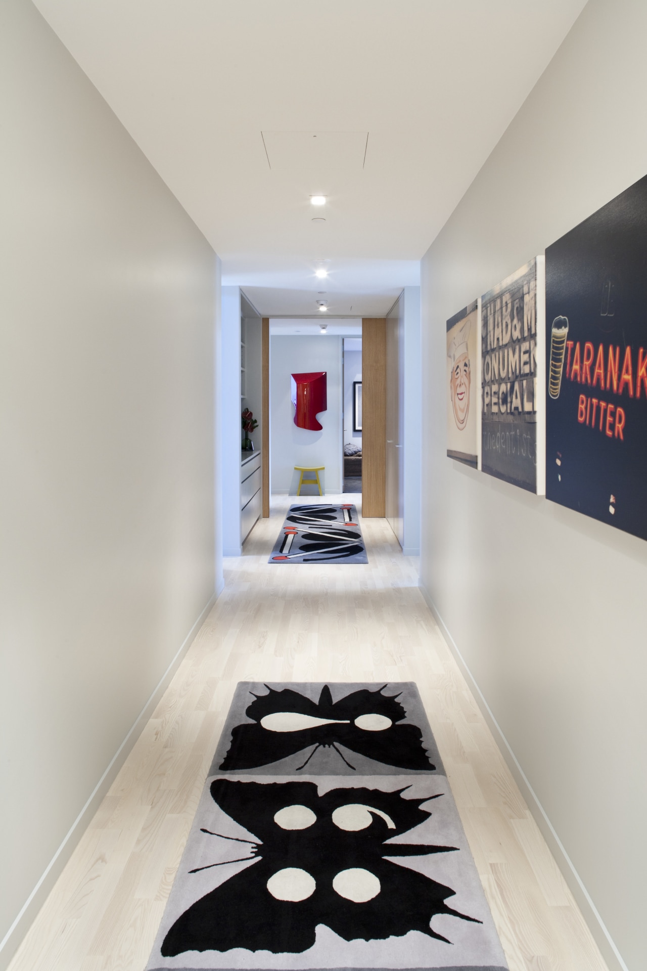 internal hallway view of an office building of ceiling, design, floor, flooring, interior design, room, wall, gray